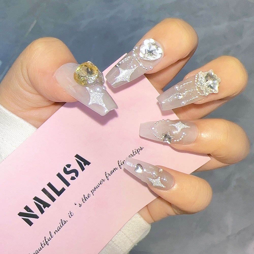 Uñas postizas translúcidas con purpurina, estrellas, copos y perlas de pedrería | Largas - Image 2