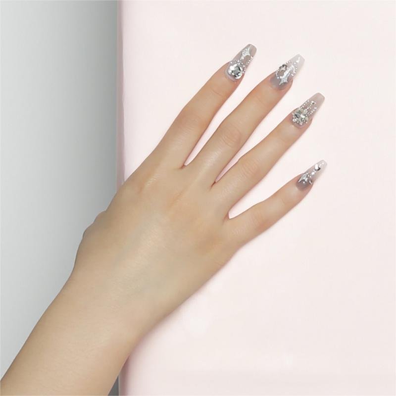 Uñas postizas translúcidas con purpurina, estrellas, copos y perlas de pedrería | Largas - Image 3
