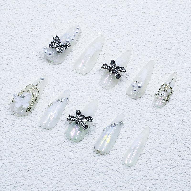 Transparente Weiße Aurora-Glitzer-Stiletto-Press-On-Nägel mit schwarzer Schleife | Lang - Image 6